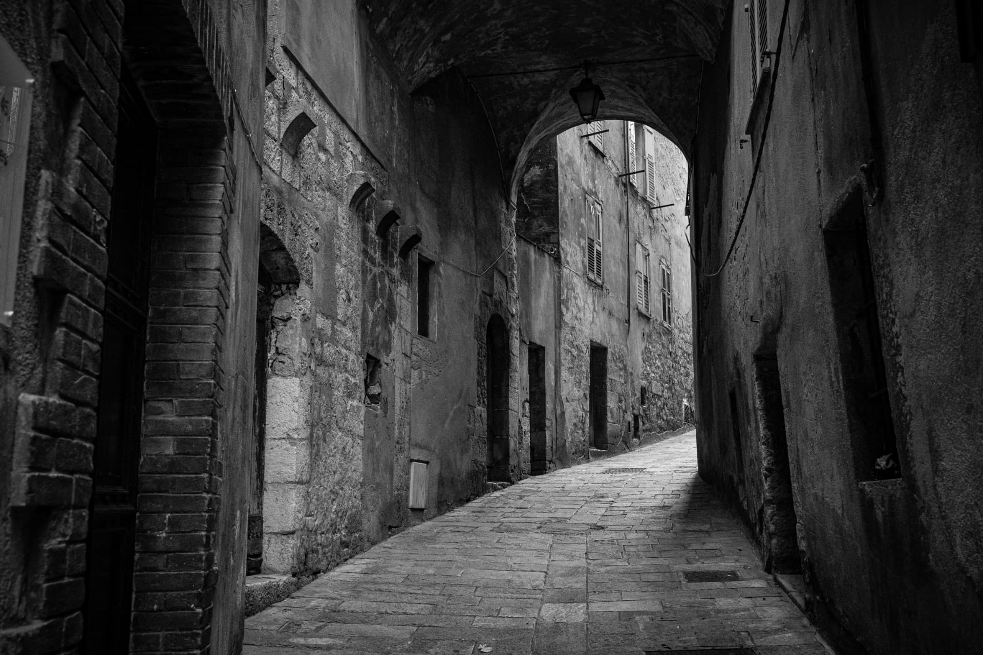 Narrow vaulted alley in an old stone town